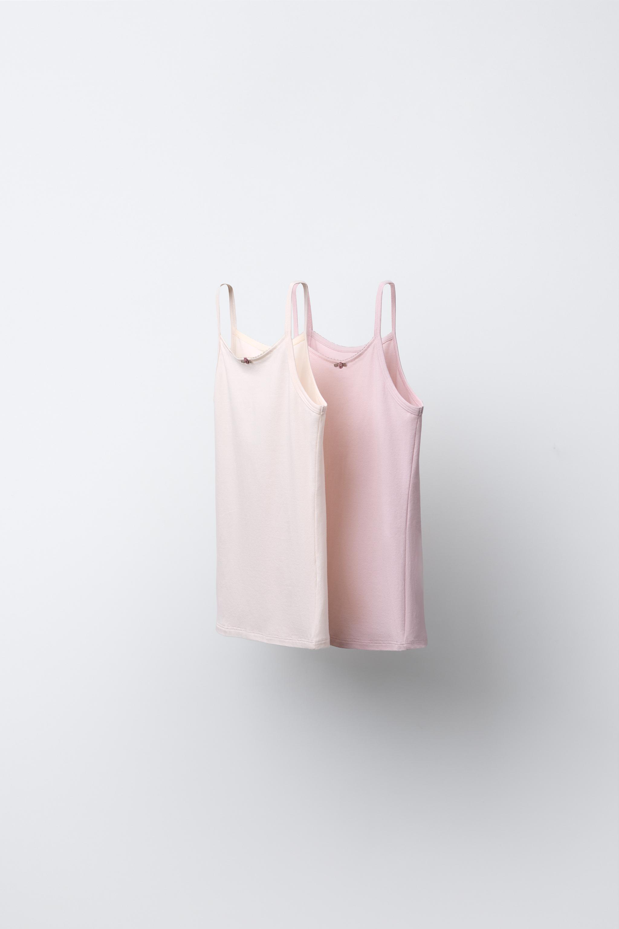 2-6/ LOT DE DEUX DÉBARDEURS FLEUR